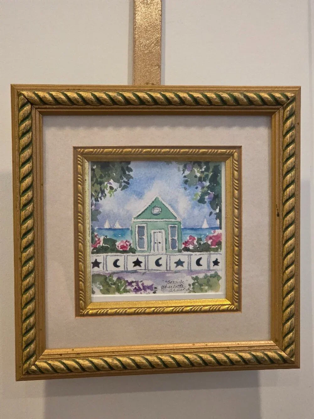 Small watercolor painting titled 